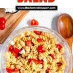 Pinterest image showing a top-view of a glass bowl containing the 4-ingredient pasta salad.