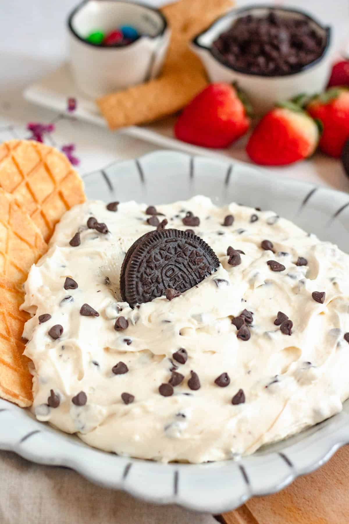 Close up shot of booty dip with oreo sticking out of it. 