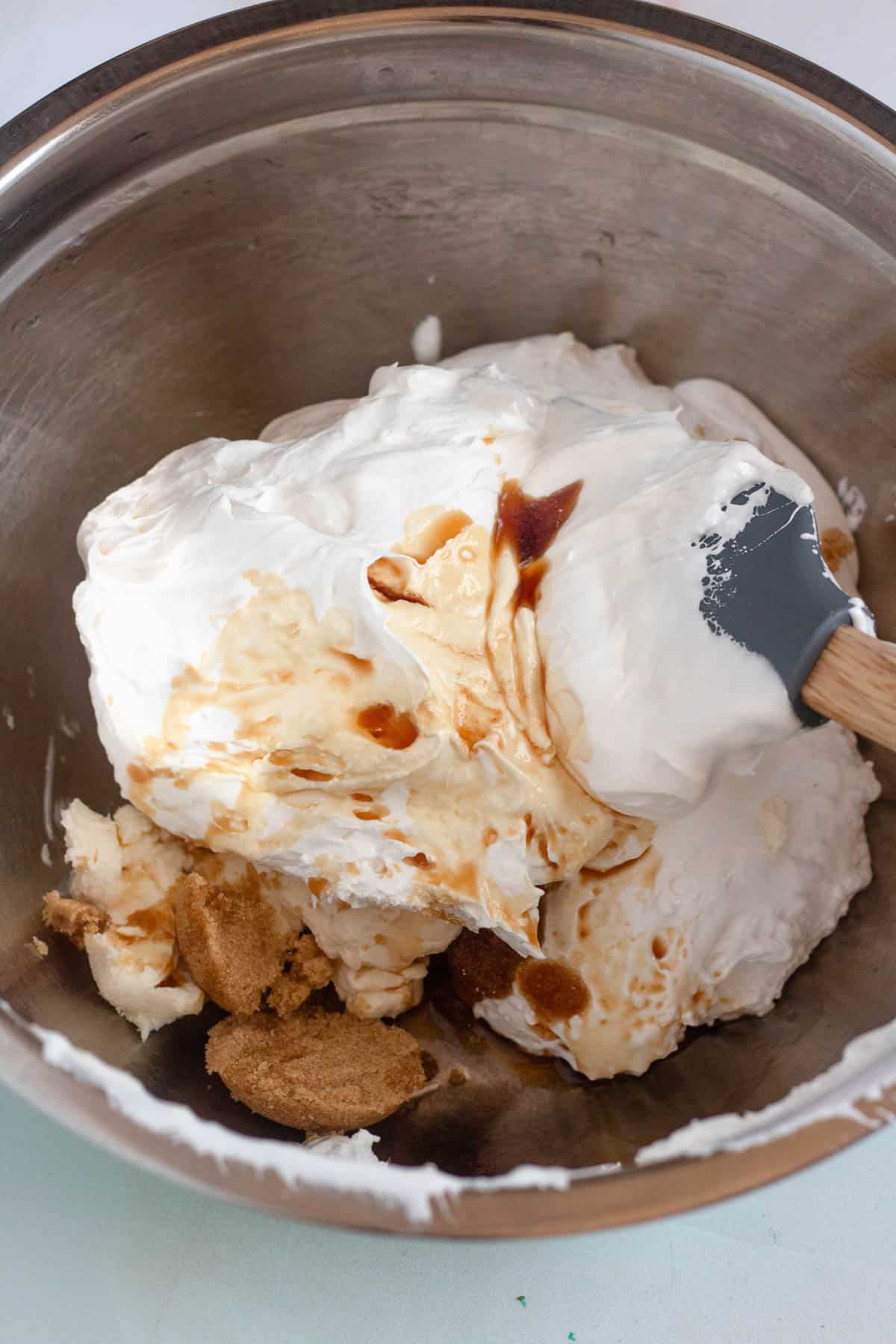 mixing bowl filled with ingredients for booty dip.