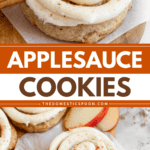 Pinterest image of applesauce cookies topped with brown butter cream cheese frosting piped over the top with apple slices and cinnamon sticks on the side.