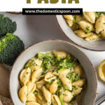 Pinterest image of an overhead shot of two bowls of broccoli pasta.