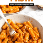 Pinterest image of a forkful of Marry Me Chicken Pasta coming out of a bowl.