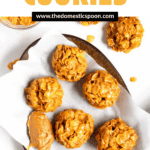 Pinterest image of Peanut Butter Cornflake Cookies on a serving plate with a spoon of peanut butter next to them.