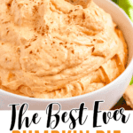Pinterest image of a full bowl of pumpkin dip with cool whip with a graham cracker in the creamy mixture.