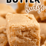 Pinterest image of a close-up shot of the creamy 3-ingredient peanut butter fudge pieces with a crumbly texture.