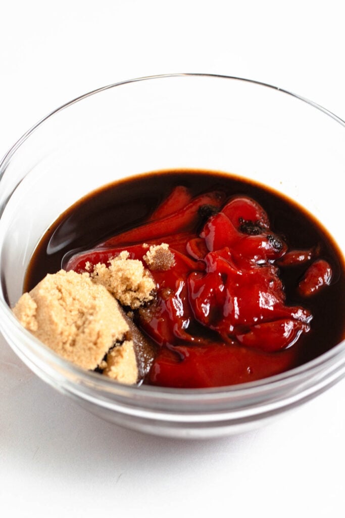 Ketchup, brown sugar, and worcestershire sauce were put together in a small bowl.