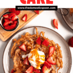 Pinterest image showing a top-view of a golden, crispy funnel cake topped with fresh strawberries, a scoop of vanilla ice cream, and a drizzle of caramel sauce.
