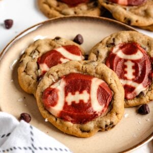 A plate of freshly baked football cookies.