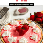 Pinterest image of a whole Kool-Aid pie with whipped cream dollops, and fresh strawberries on top in a graham cracker crust.