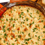 Pinterest image of a close-up shot of the golden, bubbly hot artichoke dip topped with fresh chives.