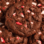 Pinterest image of a close-up shot of a stack of Chocolate Peppermint Cookies on a white plate.