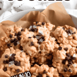 Pinterest image of a parchment-lined bowl of Avalanche Cookies topped with chocolate chips and flaky sea salt.