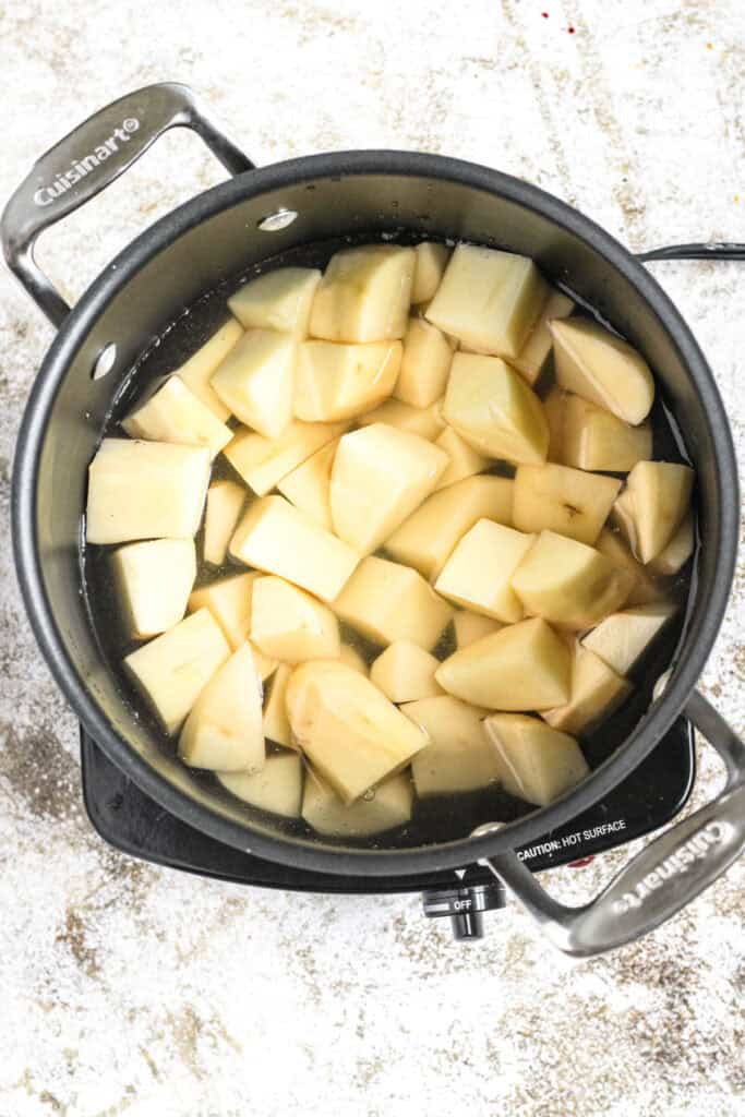 Potatoes boiling in water.