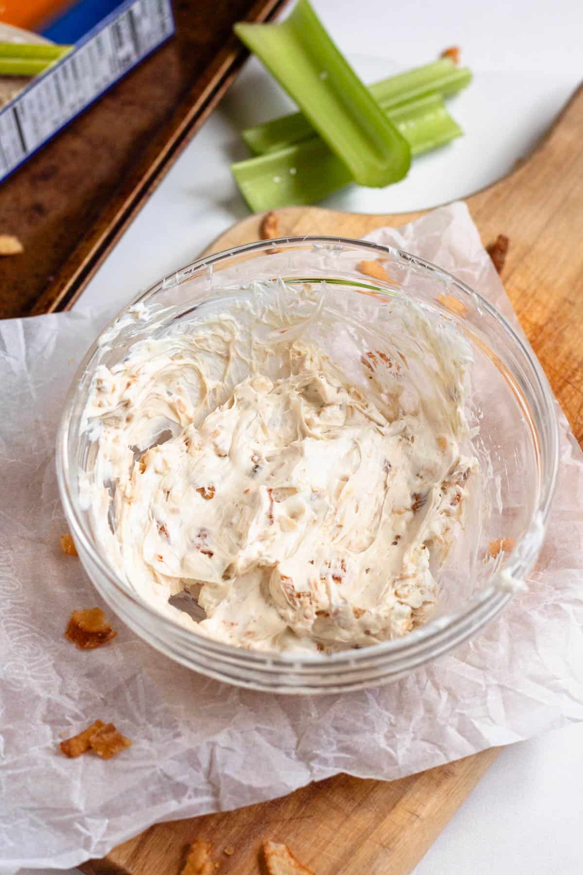 Bowl of mixed stuffed celery ingredients.